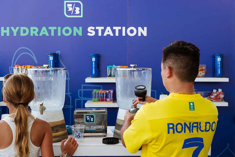 image of two people standing at a juice bar